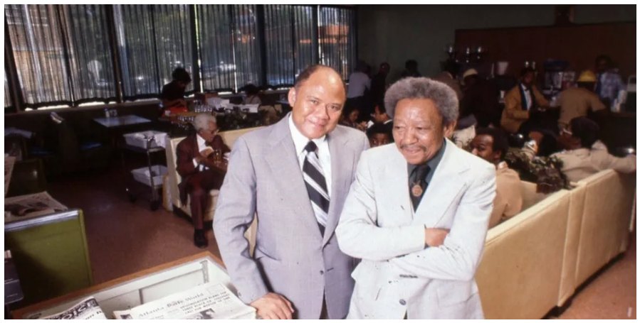 James Paschal with a guest in the restaurant lounge